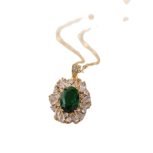 Vintage emerald green zircon pendant necklace with gold chain in floral cluster design