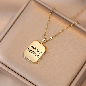 Gold chocolate bar necklace featuring a 'Where is love' pendant with pavé crystals