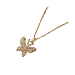 Elegant gold butterfly necklace with shimmering zircon pavé stones on a slim link chain