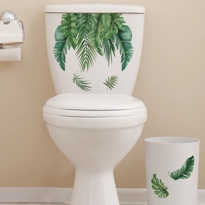 Tropical green leaves wall stickers featuring monstera and palm patterns for bathroom decor