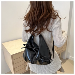 French style glossy black bow shoulder bag with pleated details for women