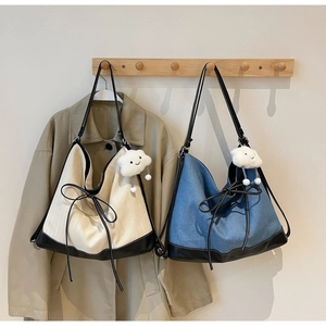 Minimalist large canvas and denim tote bags with leather patchwork and cloud charm details