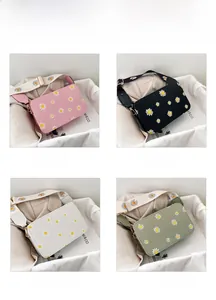 Floral crossbody bag set in pink black white and mint green with daisy wide straps