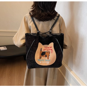Women's black velvet tote backpack with cute cat embroidery and stylish text design