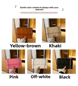 Quilted flap shoulder bags in five colors with chunky silver chain straps on display