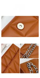 Close-up of brown quilted leather texture with silver magnetic clasp and chain strap