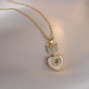 Golden heart and arrow pendant necklace with white enamel and sparkling zircon stones