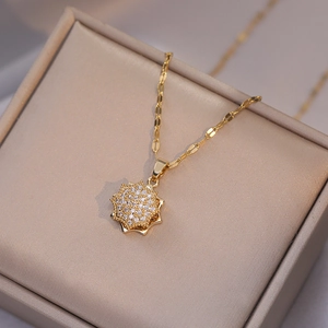 Rotating geometric flower necklace with sparkling zircon pendant in premium jewelry box