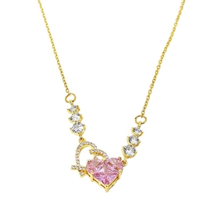 Pink heart-shaped zircon pendant necklace in gold finish with white crystal accents