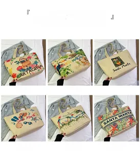 Detailed grid of six ethnic canvas tote bags with vibrant tropical and beach embroidery