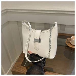 Minimalist white leather crescent shoulder bag with silver chain strap and metal buckle