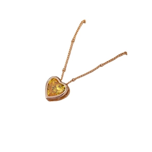 Elegant rose gold heart necklace with yellow zircon stone on a minimalist beaded chain