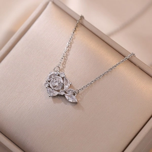 Elegant rose pendant necklace with marquise-cut zircons and fine silver chain link