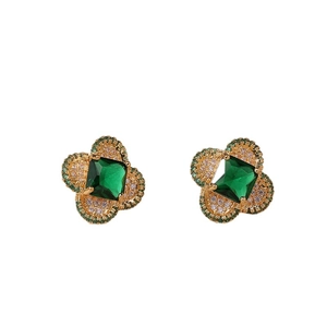 Vintage gold stud earrings with square emerald green stone and floral pavé petals