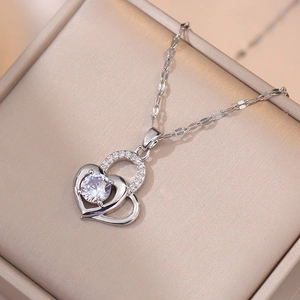 Elegant heartbeat heart pendant necklace with shimmering zircon stones in a jewelry box