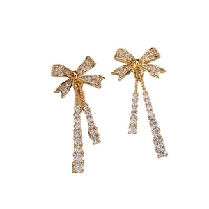 Elegant bow tassel earrings with sparkling crystals in a golden setting for women