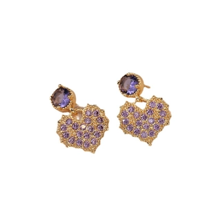 Elegant gold earrings with purple heart charms and sparkling pavé crystals