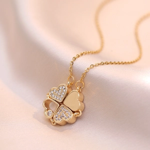 Foldable four-leaf clover heart pendant necklace in gold with zircon accents