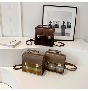 British style checkered crossbody bags with metallic locks shown in tiered display
