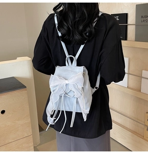 Blue ballet style backpack with large white tulle bow and ribbon drawstring detail