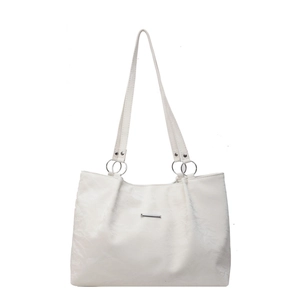 Minimalist creamy white tote bag with textured surface and silver ring handles