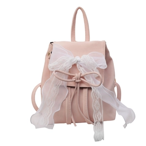 Pink ballet-style backpack featuring lace bow and ribbons in a sweet aesthetic