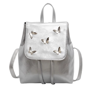 Silver metallic PU leather backpack featuring 3D butterfly accents and top handle