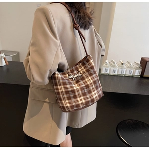 Vintage plaid bucket bag with dachshund embroidery and slim leather shoulder strap