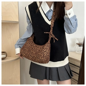Stylish leopard print crescent tote bag with adjustable tie straps for women
