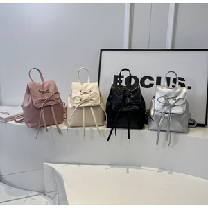 Mini fashion backpacks in pink, white, black and silver with stylish bow details