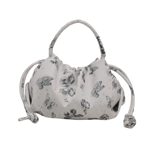 Chic ruched underarm bag with butterfly print and drawstring details in cream white