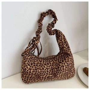 Stylish leopard print tote bag with elastic ruched handle and crescent moon shape design