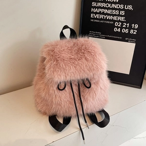 Pink fluffy faux fur backpack with black straps and drawstring for school commute