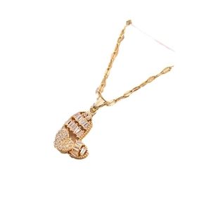 Rotating double heart pendant necklace in gold finish with sparkling zircon stones