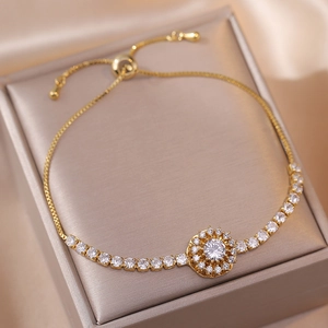 Elegant gold sun flower bracelet with sparkling zircons and adjustable pull chain