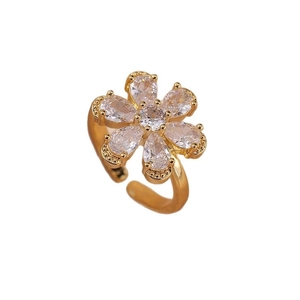 Adjustable gold flower ring with pear-cut zircon petals and a central round stone