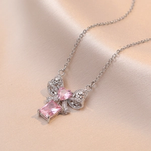 Collier Pendentif Nœud Cœur Élégant Acier Titane Avec Zircon Rose Strass Incrusté Chaîne Clavicule Pour Femmes