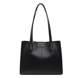 Large black leather tote bag with double shoulder straps and fashion label on front