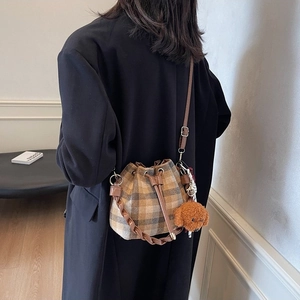 Retro plaid drawstring bucket bag with leather woven handle and cute bear charm pendant