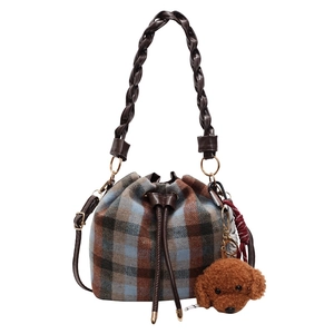 Vintage wool leopard plaid bucket bag with braided handle and plush puppy pendant