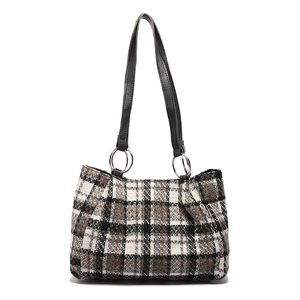 Classic black and white checkered tweed tote bag with silver rings and sturdy double straps