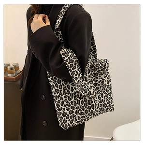 Close-up of leopard print heavy canvas fabric texture on a large capacity tote bag