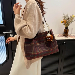Vintage plaid wool shoulder bag with teddy bear charm and gold chain detail