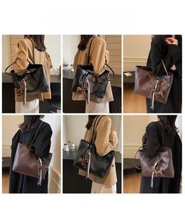 Detailed views of large vintage tote bags in black and brown with silk scarf accessories