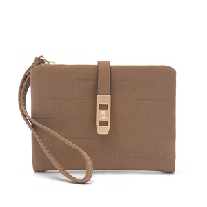 Detail of brown lychee-grain PU leather wallet with gold buckle and embossed stitching