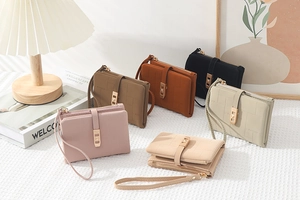 Quilted faux leather short wallets with detachable wrist straps and gold metal zipper detail