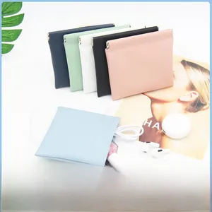 Detail view of colorful automatic self-closing PU leather storage pouches for accessories