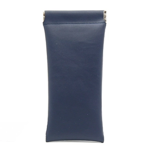 Detail of navy blue PU leather glasses pouch featuring a secure metal squeeze closure