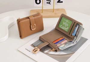 Detail of short PU leather wallet interior with card slots and tulip metal clasp