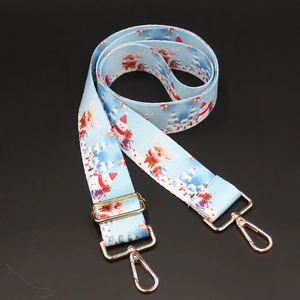 Detail of Christmas snowman canvas strap with golden hooks for crossbody bags